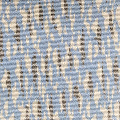 Wool-blend broadloom carpet swatch in a repeating abstract print in cream and gold on a sky blue field.