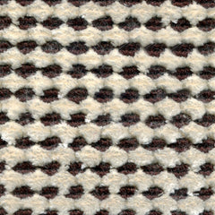Wool-silk broadloom carpet swatch in a dimensional flat-and-tufted grid weave in cream and dark brown.