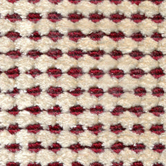 Wool-silk broadloom carpet swatch in a dimensional flat-and-tufted grid weave in cream and burgundy.