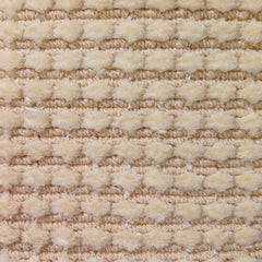 Wool-silk broadloom carpet swatch in a dimensional flat-and-tufted grid weave in cream.