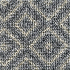 Wool broadloom carpet swatch in a repeating diamond pattern in tan on a gray field.