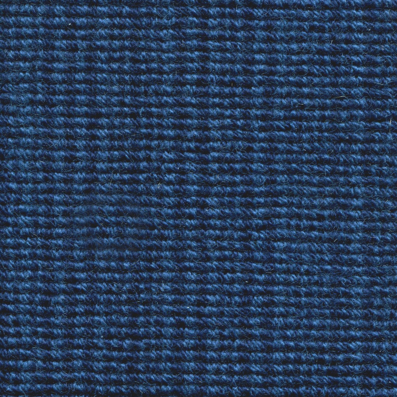 Wool broadloom carpet swatch in a chunky striped weave in blue and navy.