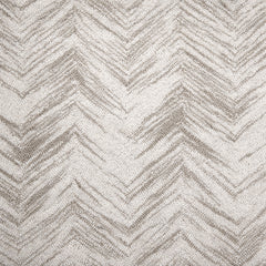 Wool broadloom carpet swatch in a painterly herringbone print in light sable on a cream field.