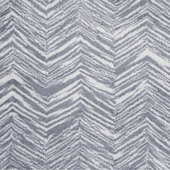 Wool broadloom carpet swatch in a painterly herringbone print in blue-gray on a white field.