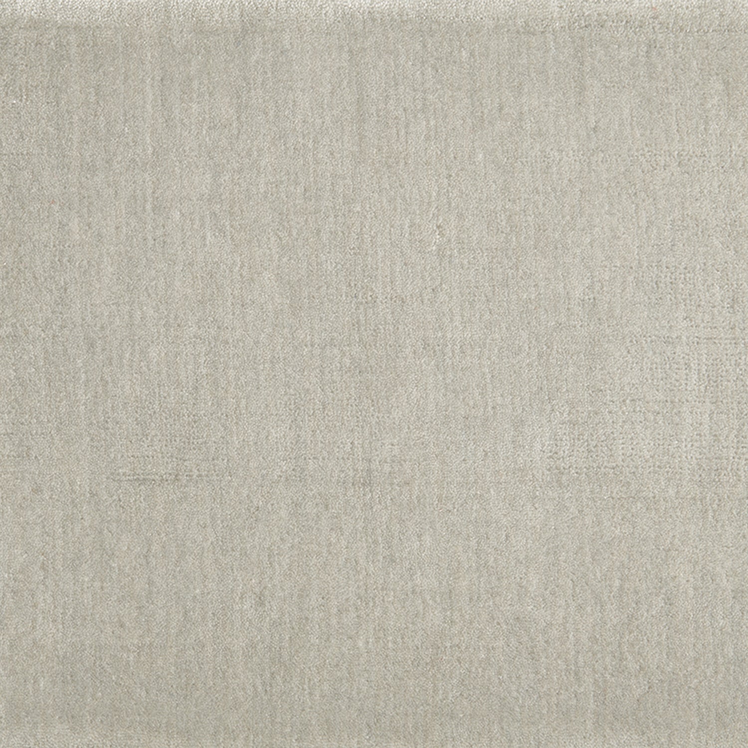 Nylon broadloom carpet swatch in a cut pile texture in light gray.