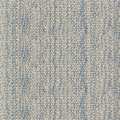 Nylon broadloom carpet swatch in a ribbed weave in mottled tan and blue.