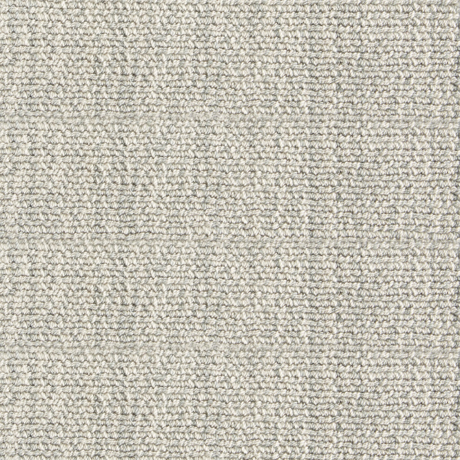 Nylon broadloom carpet swatch in a ribbed weave in mottled cream and sage.