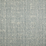 Wool broadloom carpet swatch in a chunky weave in mottled blue and cream.