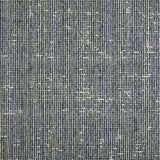 Wool broadloom carpet swatch in a chunky weave in mottled black and white.