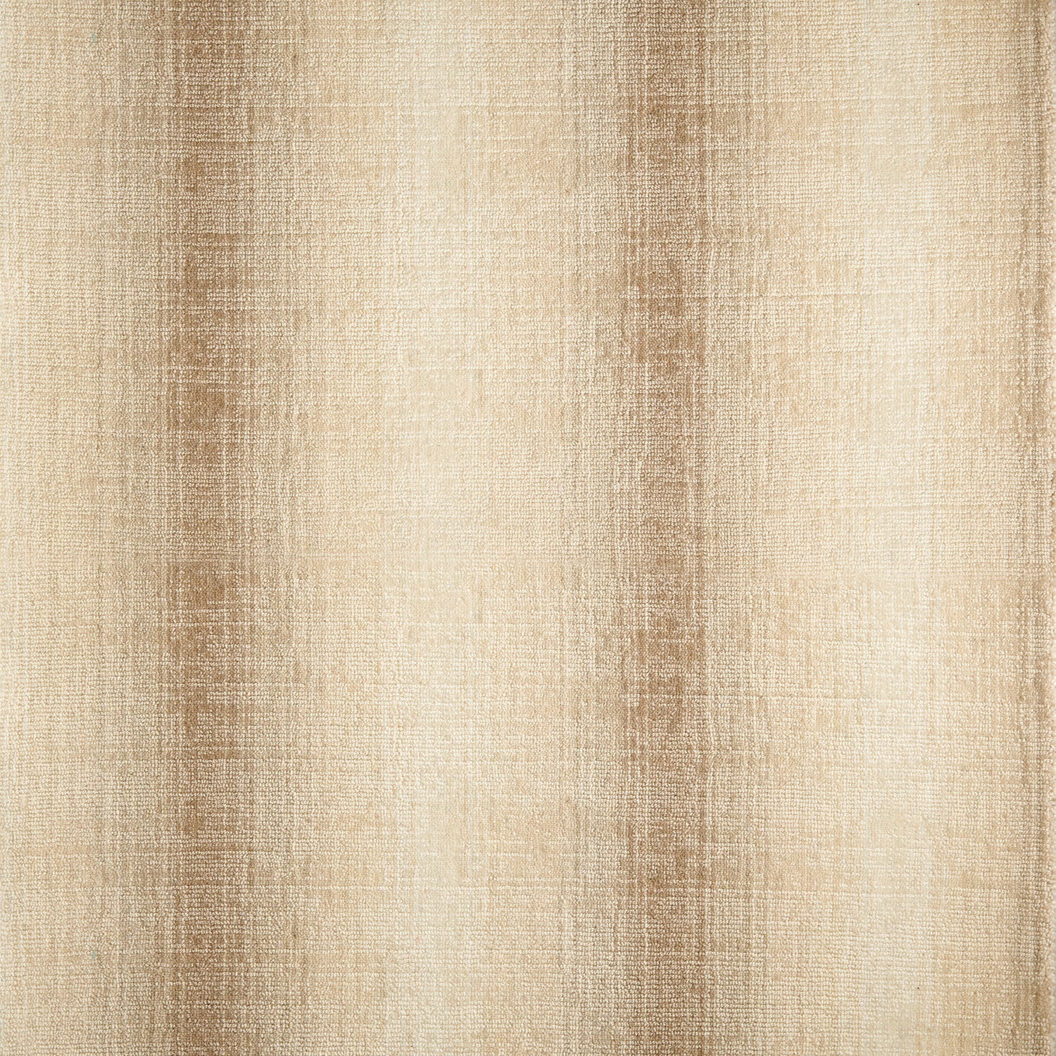 Wool-blend broadloom carpet swatch in an ombré stripe print in shades of cream, tan and brown.