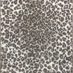 Wool broadloom carpet swatch in a cheetah print in charcoal and brown on a cream field.