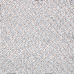 Wool broadloom carpet swatch in a repeating geometric weave pattern in light pink on gray-blue.