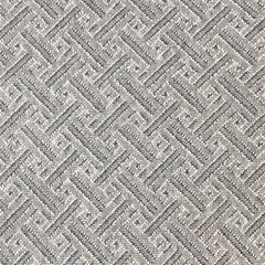 Wool broadloom carpet swatch in a looped geometric weave in gray with a white and charcoal lattice pattern.