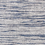 Wool-blend broadloom carpet swatch in a chunky weave in mottled white and navy.