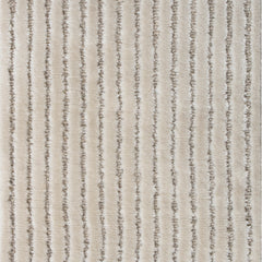 Wool-blend broadloom carpet swatch in a dimensional ribbed weave in cream.
