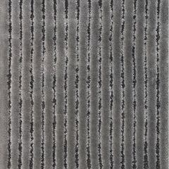 Wool-blend broadloom carpet swatch in a dimensional ribbed weave in gray.
