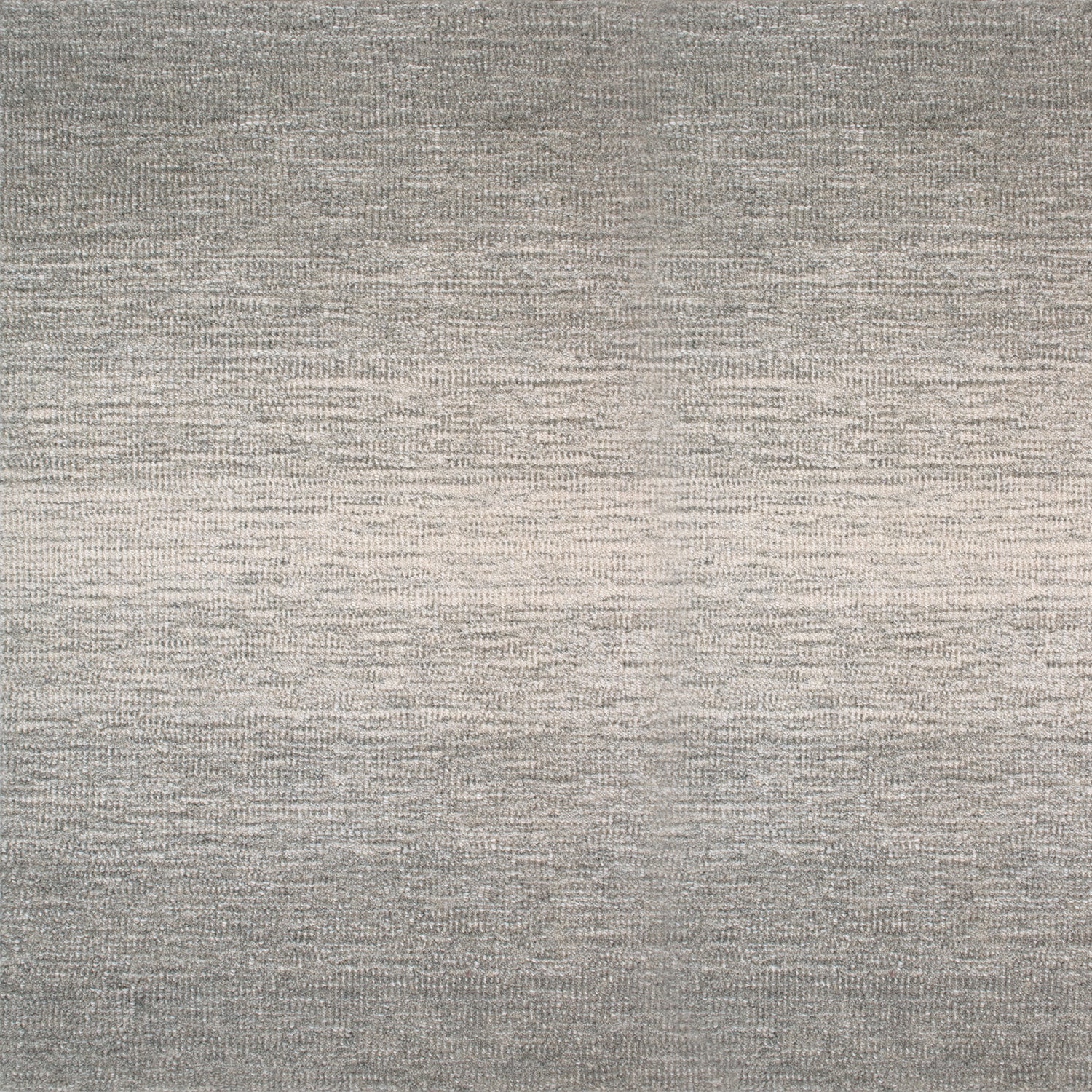 Wool broadloom carpet swatch in an ombré weave in shades of cream and gray.