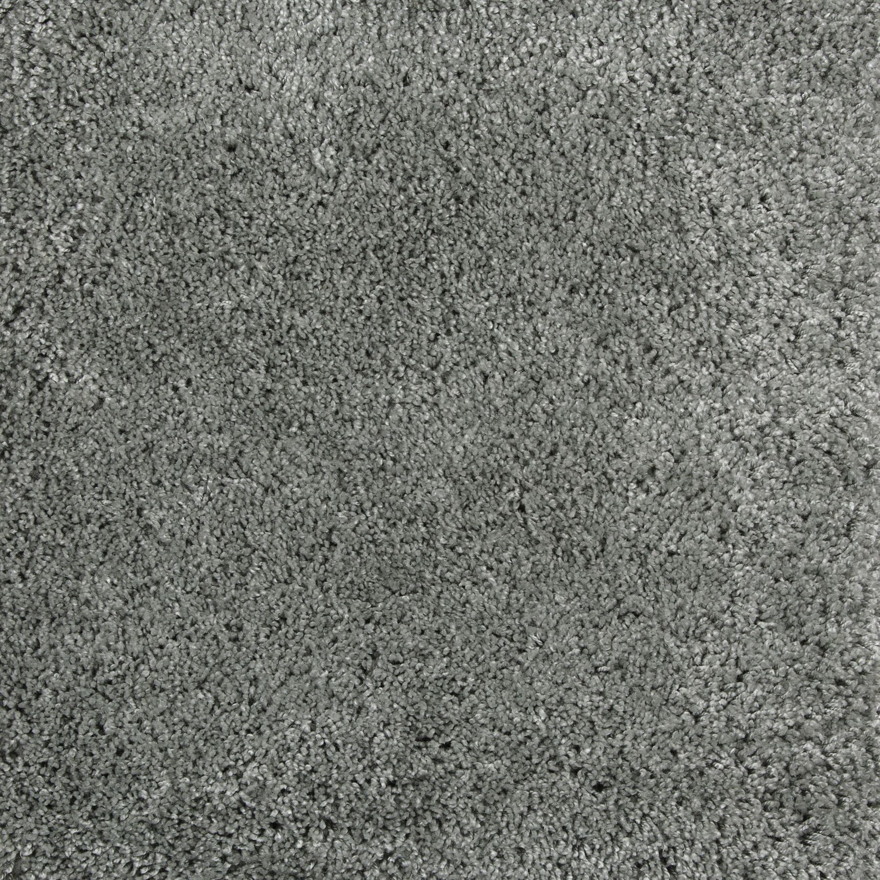 Synthetic broadloom carpet swatch in a cut pile texture in gray-green.