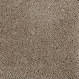 Synthetic broadloom carpet swatch in a cut pile texture in sable.