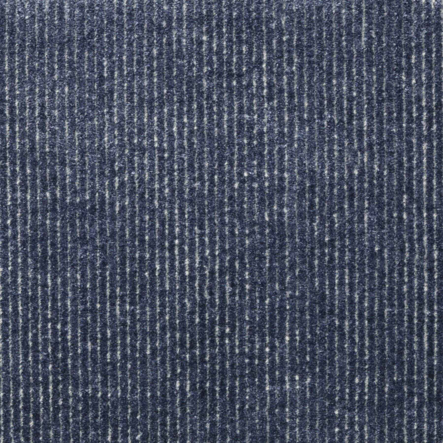 Synthetic-blend broadloom carpet swatch in a dimensional ribbed weave in navy.