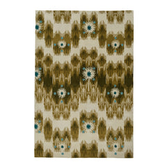 Estrella Rug in Lichen features a painterly abstract ikat in shades of olive and ecru with star shaped accents in cyan and teal