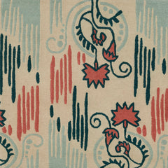 Detail of Fenwick Floral rug featuring a graphic floral motif paired with a painted linear design in light blue, dark teal and coral pink on an ivory background