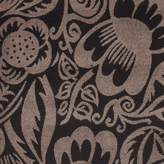 Wool-silk broadloom carpet swatch in a floral paisley pattern in mauve on a dark brown field.