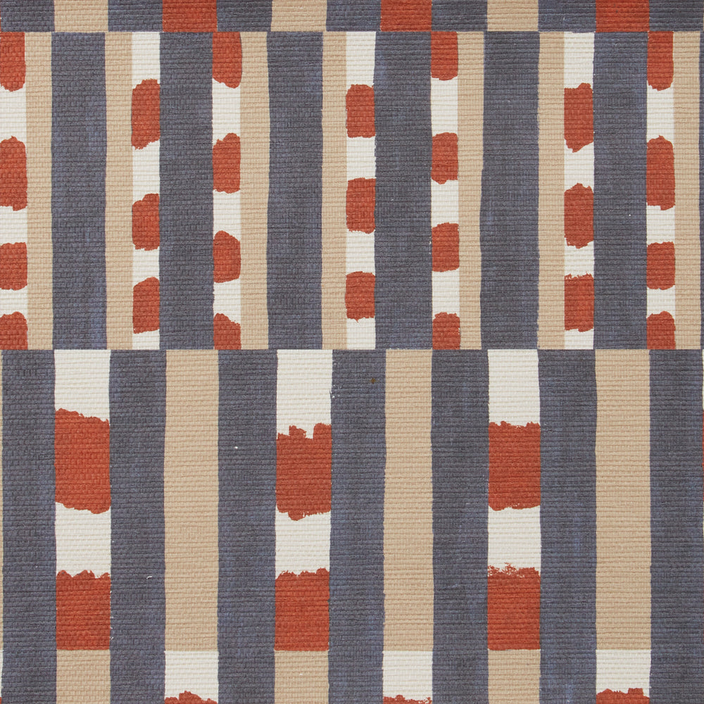 Detail of a textured wallpaper with a pattern of vertical stripes of light brown, navy blue and dashes of rust red and white.