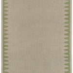 Waver Rug in Sage, a strated taupe field with a sage green flame stitch border. 
