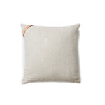 Backside of a square throw pillow in a solid linen fabric in light gray.