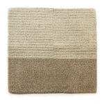 Handknotted Ridge rug sample in tan natural colors with fringe detail