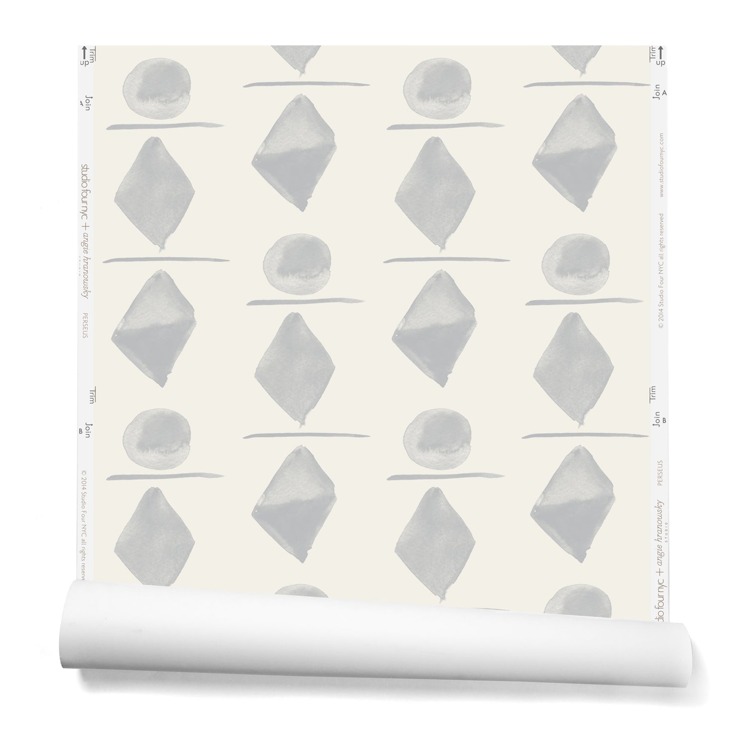 Partially unrolledwallpaper in a large-scale pattern of gray watercolored diamonds, circles and lines on a cream background. 