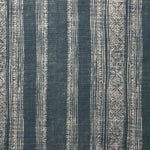 Woven fabric swatch in a striped pattern of intricate white lines over a washed navy background.