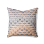 Square throw pillow in a linear pattern with a sand dune-shaped triangle stripe motif in shades of tan, brown and gray.