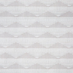Swatch of linen fabric in a linear pattern with a sand dune-shaped triangle stripe motif in shades of cream and white.