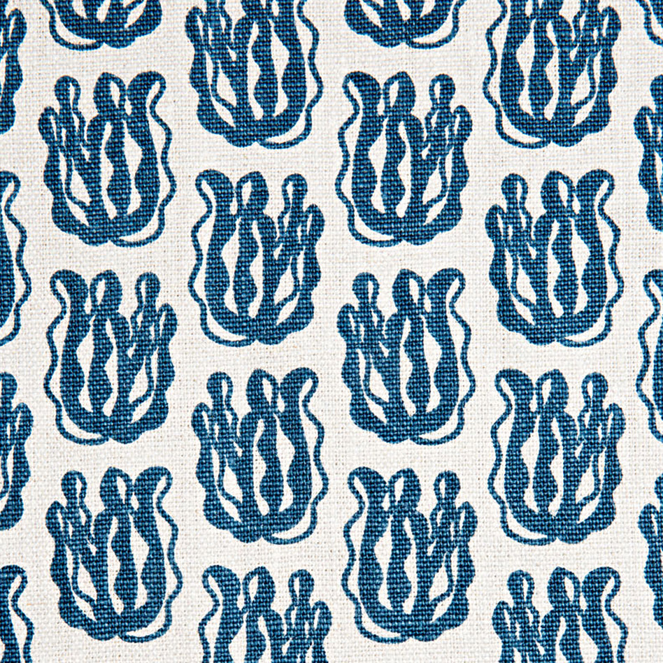 Woven fabric swatch with a repeating cartoon seaweed print in blue on a white background.