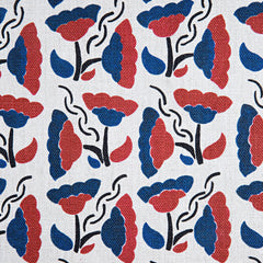 Woven fabric swatch with a repeating pattern of large-scale graphic flowers in shades of red and blue on a cream background.