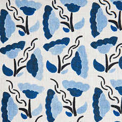 Woven fabric swatch with a repeating pattern of large-scale graphic flowers in shades of blue on a cream background.