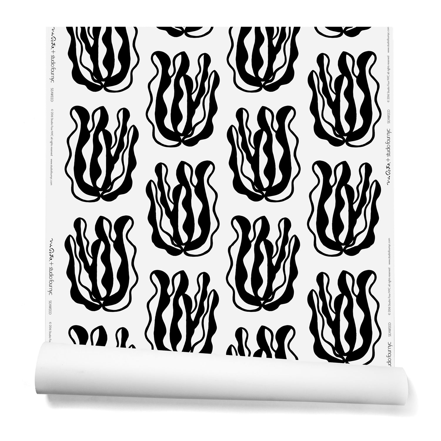 A hanging roll of wallpaper with a large-scale cartoon seaweed print in black on a white background.