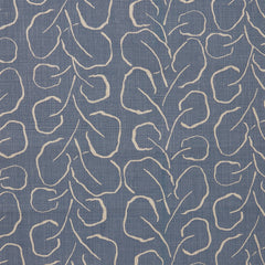 Woven fabric swatch with a large-scale repeating leaf print in tan on a French blue background.
