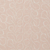 Woven fabric swatch with a large-scale repeating leaf print in white on a light pink background.