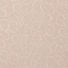 Woven fabric swatch with a large-scale repeating leaf print in white on a light pink background.